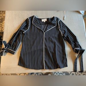 Black and white striped blouse with cute tie sleeves and open lapel